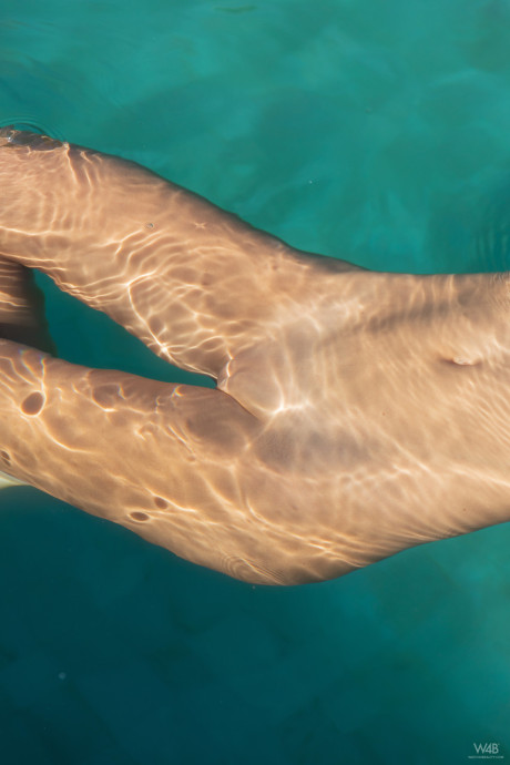 Alluring teenie Clover swims all nude and flashes her perky tits outdoors - #204403