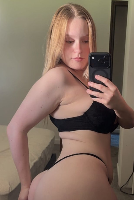 Blondy amateur takes selfies while going bare-breasted in a thong and nylon panties - #322863