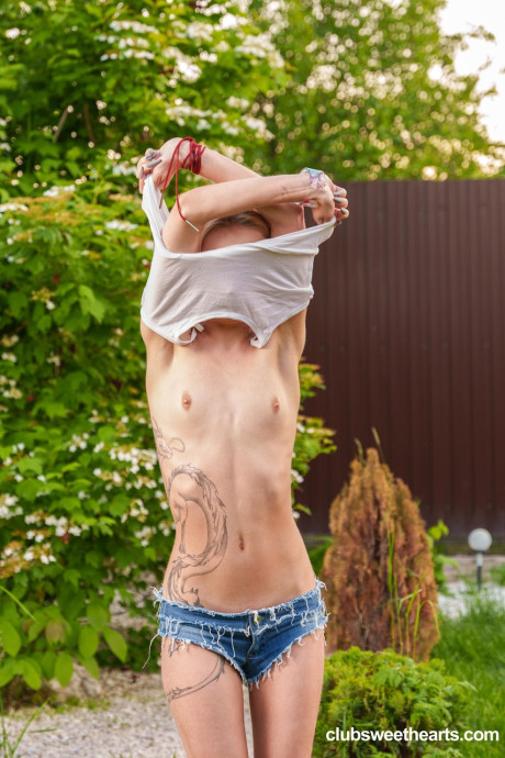 Slender European young Tea Mint flaunts her tiny tits and masturbates outdoors - #235250