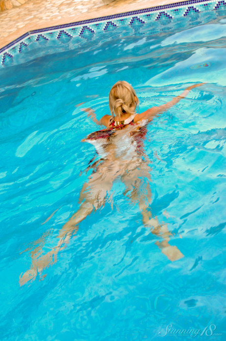 Older blonde Larissa H gets totally naked at a swimming pool - #186417