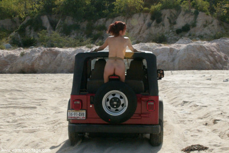 Attractive MILF with amazing titties Sasha Monet gets tied naked to a Jeep - #277325
