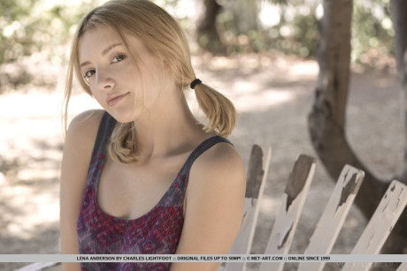 Young first timer Lena Anderson vaunts her lithe body under a tree outside - #180247