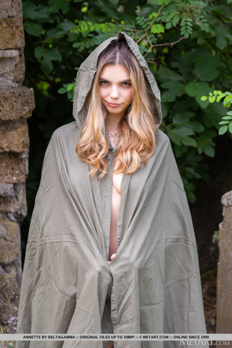 Ravishing young Annette gets undressed in a backyard while holding a sword - #289753