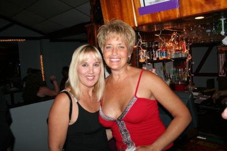 Kinky swinger wives French kiss and pose provocatively at a party - #123032