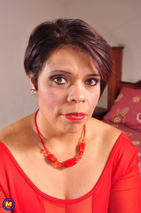 Lovely mature in a red dress Faby licks a stiff boner and shows her bushy snatch - #247512