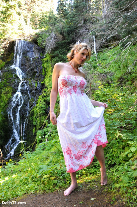Busty blonde tgirl uncovers her humongous boobies before showing her meat - #289475