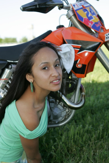 Breathtaking latina Pamy posing for outdoors for a motorcycle magazine - #121322