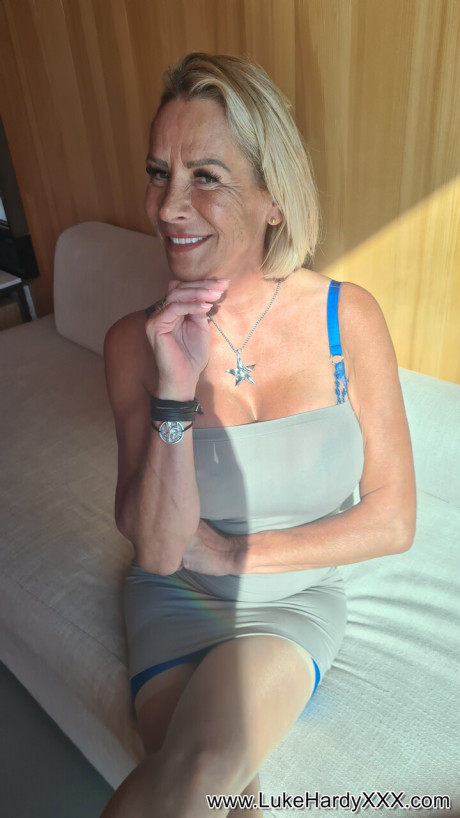 Blondy British girl Victoria May exposes her brassiere while wearing hose - #214661