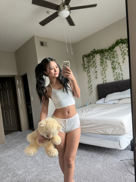 Lovely asian young Luv Hanna Zuki sticks out her tongue during naked play - #219482